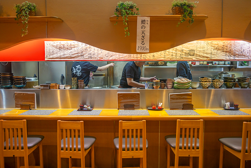 View of chefs busy at work through restaurant window in Omicho Market, Kanazawa City, Ishikawa Prefecture, Honshu, Japan, Asia