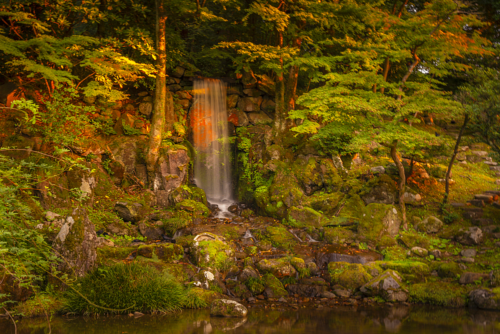 View of Hisago-ike Pond and waterfall in Kenrokumachi Japanese Garden, Kanazawa City, Ishikawa Prefecture, Honshu, Japan