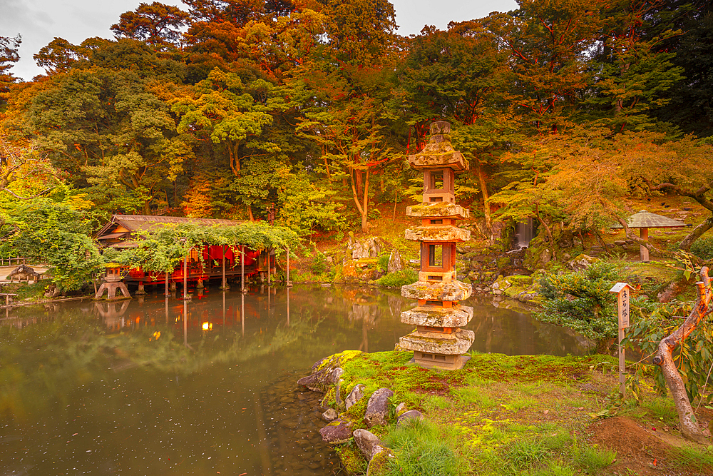 View of Hisago-ike Pond and Kaiseki Pagoda in Kenrokumachi Japanese Garden, Kanazawa City, Ishikawa Prefecture, Honshu, Japan