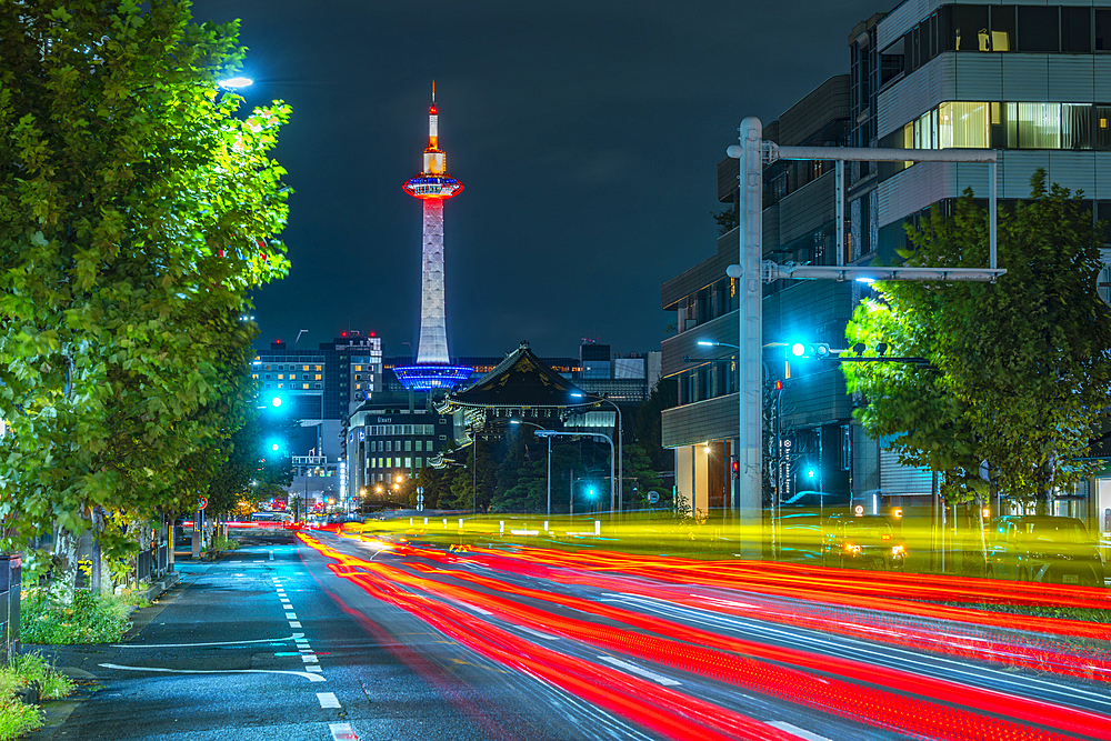 View of Nidec Kyoto Tower and trail lights at night, Shimogyo Ward, Higashishiokojicho, Kyoto, Honshu, Japan