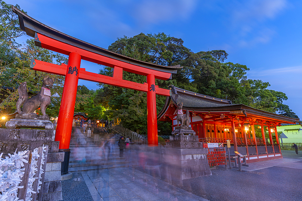 View of Torii Gate at Kyoto's Fushimi Inari Buddist Temple at dusk, Fukakusa Yabunouchicho, Fushimi Ward, Kyoto, Japan, Asia