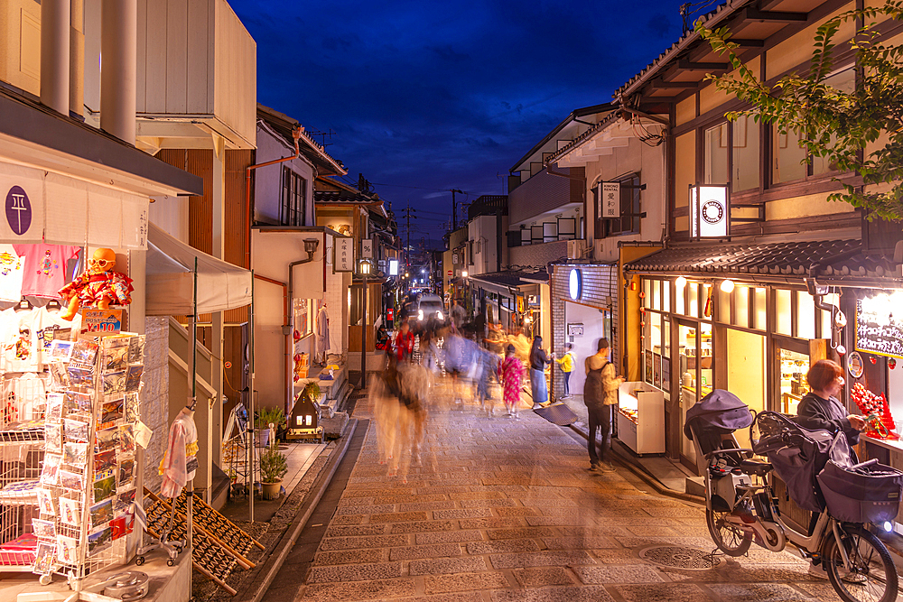 View of shops and narrow street in Sannen Zaka in Gion at dusk, Kyoto Geisha District, Kyoto, Honshu, Japan