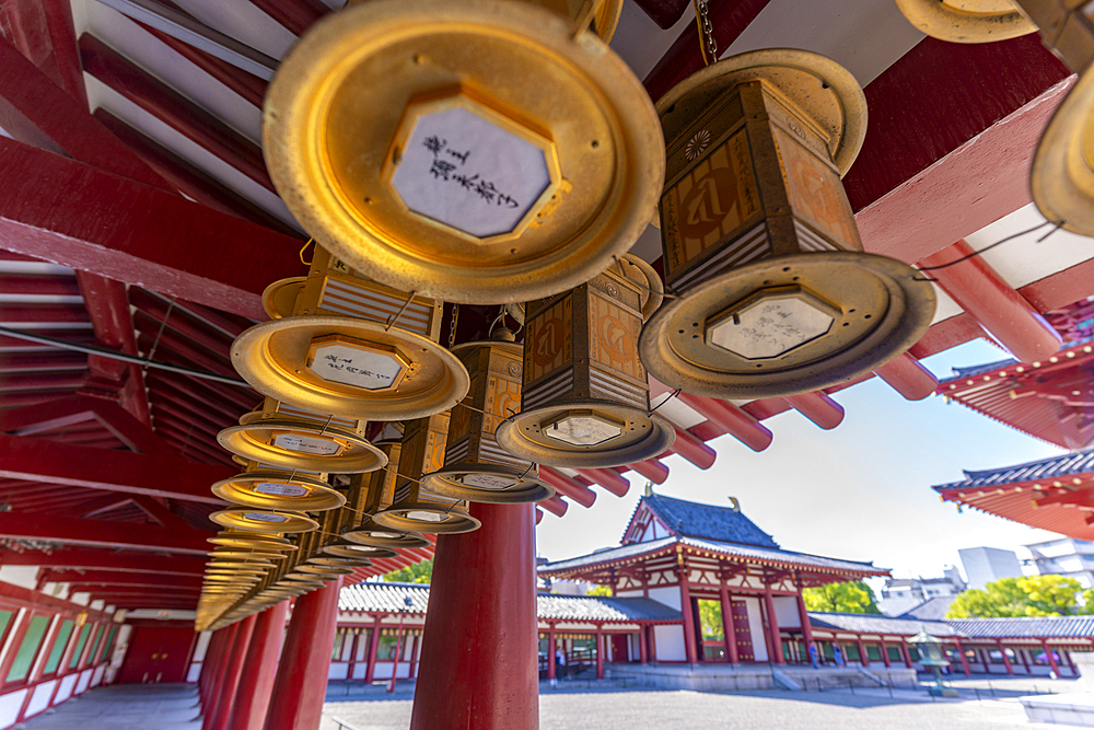 View of corridor surounding the courtyard at Shitenno-ji Gojunoto Temple on a sunny day, Shitennoji, Tennoji Ward, Osaka, Honshu, Japan