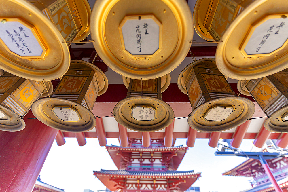 View of corridor surounding the courtyard at Shitenno-ji Gojunoto Temple on a sunny day, Shitennoji, Tennoji Ward, Osaka, Honshu, Japan