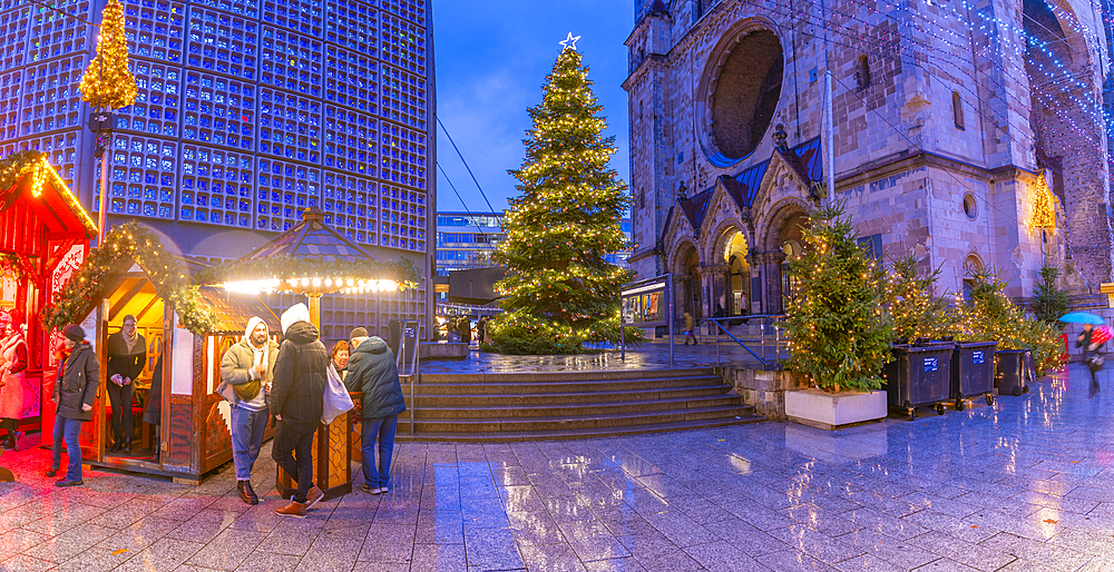 View of Kaiser Wilhelm Memorial Church and market stalls at Christmas, Breitscheidplatz, Berlin, Germany, Europe