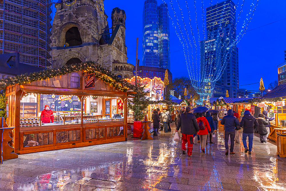 View of Kaiser Wilhelm Memorial Church and market stalls at Christmas, Breitscheidplatz, Berlin, Germany, Europe