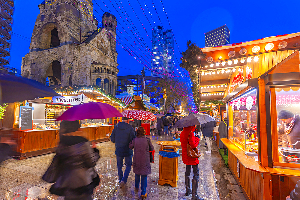 View of Kaiser Wilhelm Memorial Church and market stalls at Christmas, Breitscheidplatz, Berlin, Germany, Europe