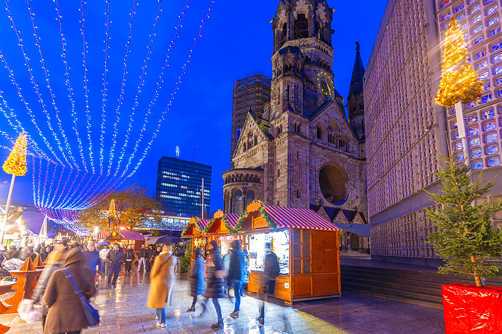 View of Kaiser Wilhelm Memorial Church and market stalls at Christmas, Breitscheidplatz, Berlin, Germany, Europe