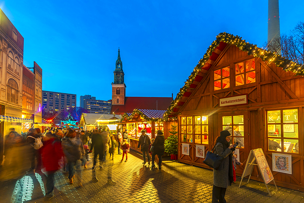 View of St. Mary's Church and Christmas market in Wasserkaskaden at dusk, Mitte, Berlin, Germany, Europe