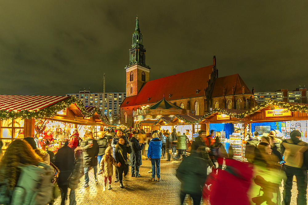 View of St. Mary's Church and Christmas market in Wasserkaskaden at dusk, Mitte, Berlin, Germany, Europe