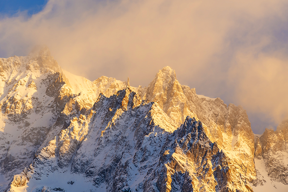 View of snow covered mountains from Courmayeur at sunrise during winter, Courmayeur, Aosta Valley, Italy, Europe