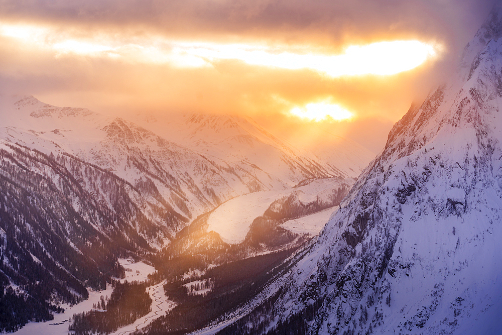 View of snow covered Aosta Valley and mountains from Pavillon du Mont Fréty in winter, Courmayeur, Aosta Valley, Italy, Europe