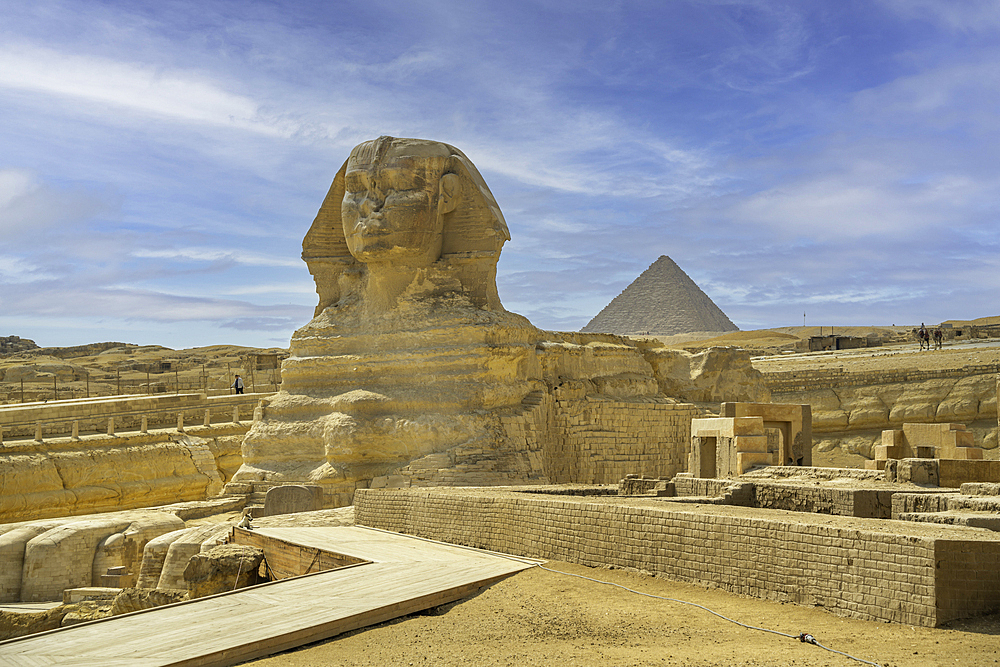 View of the Sphinx at the Pyramids of Giza on a sunny day, Giza, Cairo, Egypt, Africa