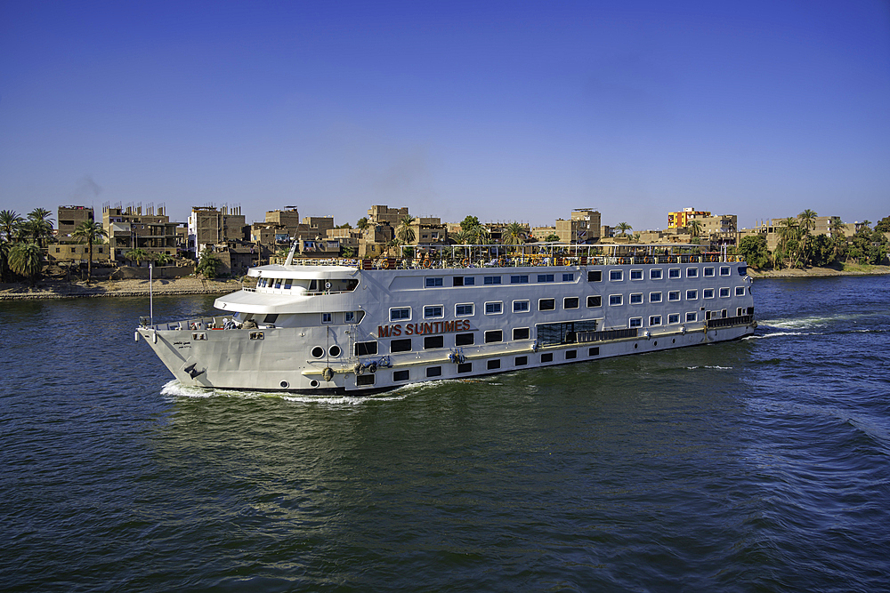 View of cruise boat from cruise boat near Armant on the Nile River, Luxor, Egypt, Africa