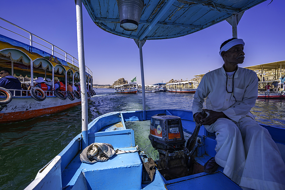 Onboard boat trip to at Temple at Philae on a sunny day, Aswan, Nubia, Egypt, North Africa, Africa