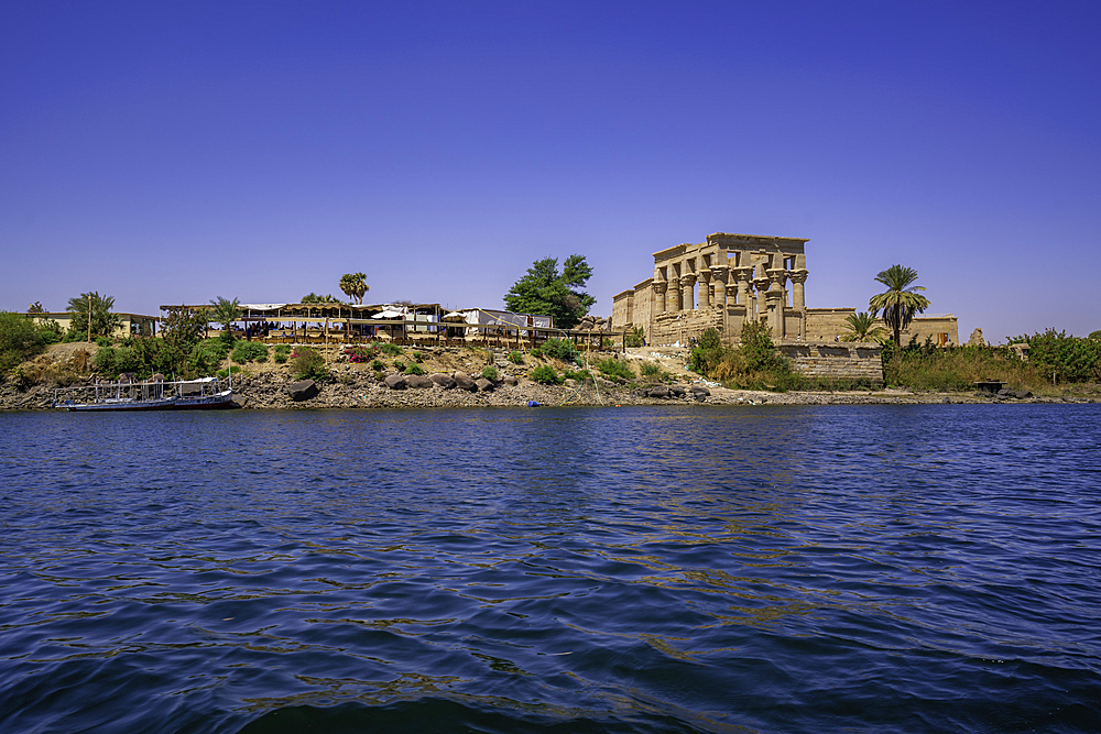 Onboard boat trip to at Temple at Philae on a sunny day, Aswan, Nubia, Egypt, North Africa, Africa