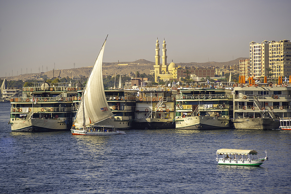 View of fellucas on the Nile river on a sunny day, Aswan, Nubia, Egypt, North Africa, Africa