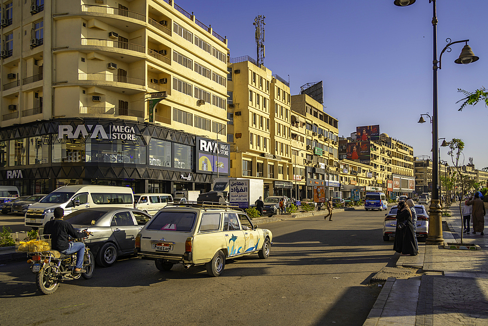 View of buildings on the Nile river promenade on a sunny day, Aswan, Nubia, Egypt, North Africa, Africa