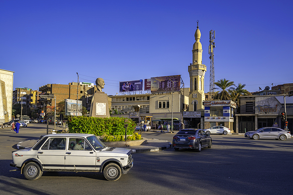 View of buildings on the Nile river promenade on a sunny day, Aswan, Nubia, Egypt, North Africa, Africa