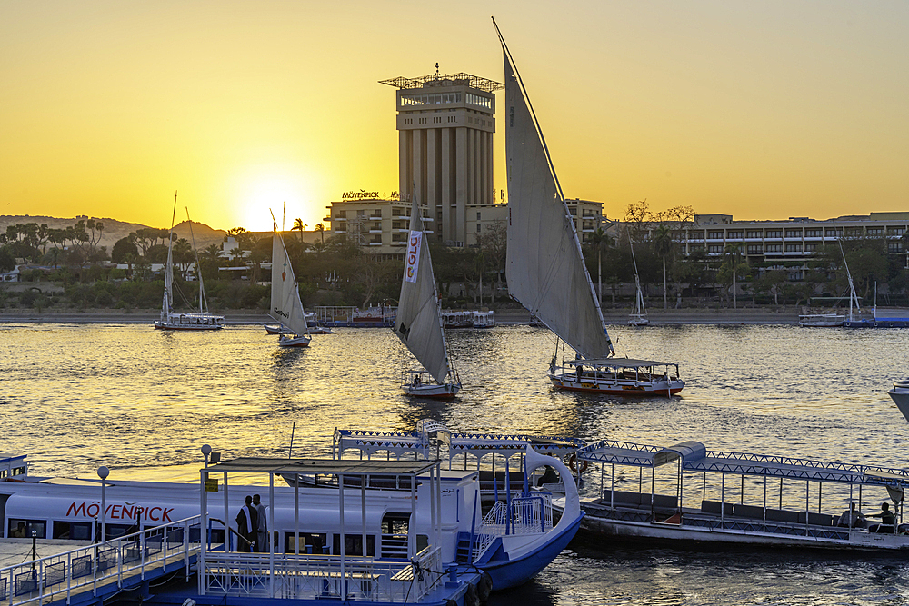 View of fellucas on the Nile river during sunset, Aswan, Nubia, Egypt, North Africa, Africa
