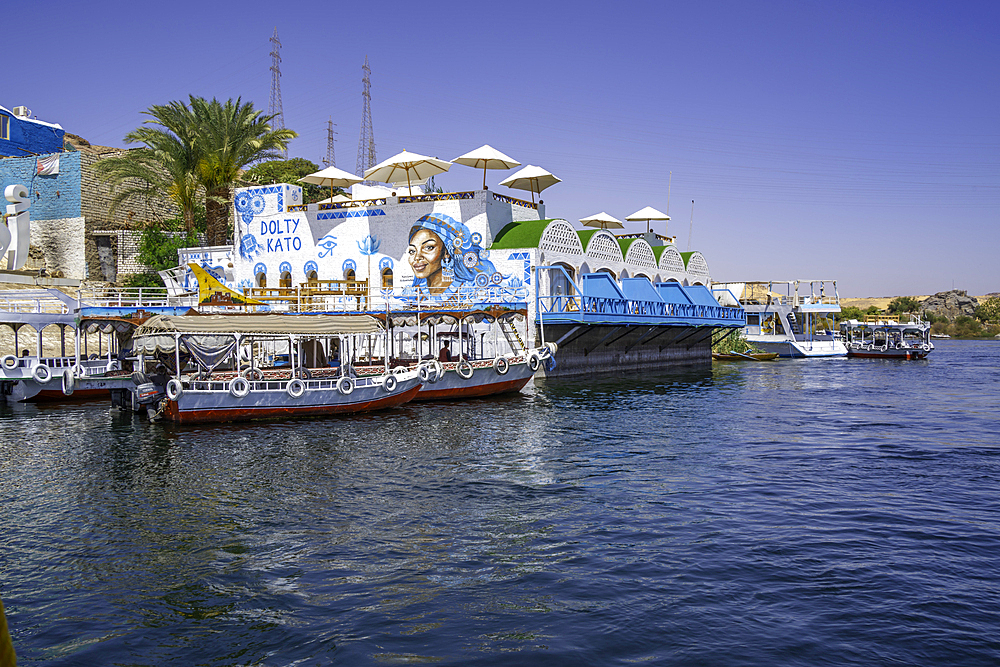 View of colourful architecture at Nagaa Suhayl Gharb on the Nile river near Aswan, Aswan, Nubia, Egypt, North Africa, Africa