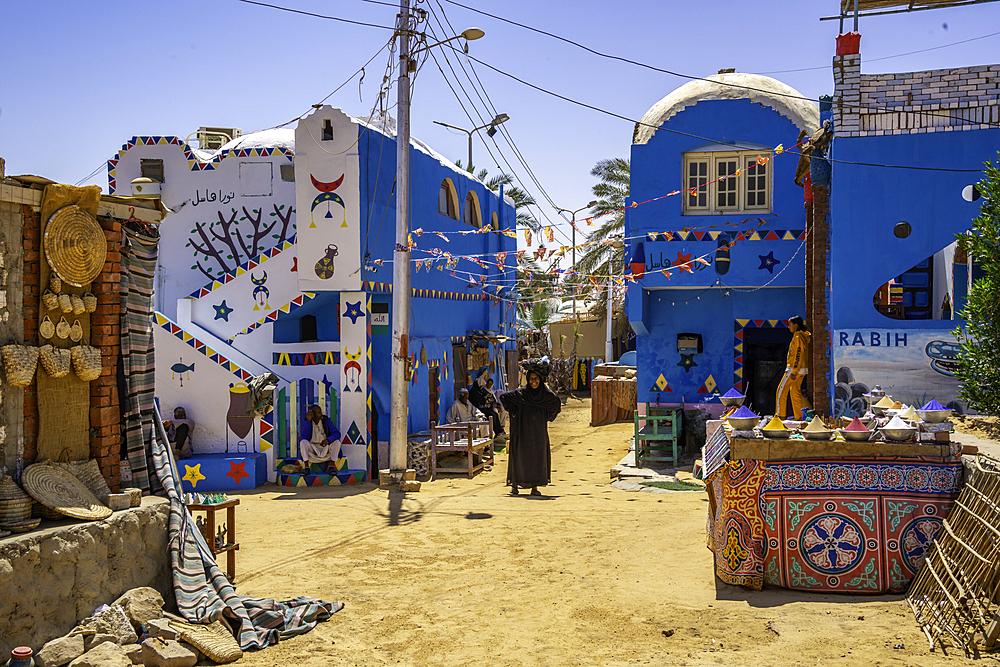 View of colourful architecture at Nagaa Suhayl Gharb on the Nile river near Aswan, Aswan, Nubia, Egypt, North Africa, Africa