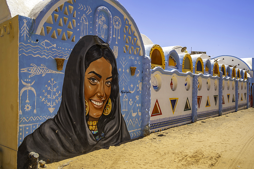 View of colourful architecture at Nagaa Suhayl Gharb on the Nile river near Aswan, Aswan, Nubia, Egypt, North Africa, Africa