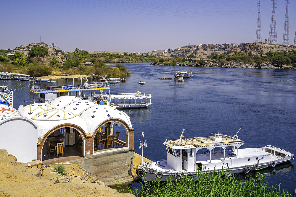 View of colourful architecture at Nagaa Suhayl Gharb on the Nile river near Aswan, Aswan, Nubia, Egypt, North Africa, Africa