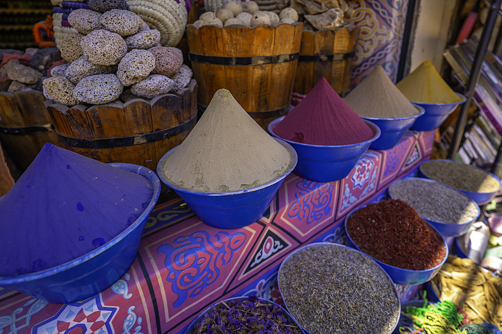 View of colourful spices on market stalls at Nagaa Suhayl Gharb on the Nile river near Aswan, Aswan, Nubia, Egypt, North Africa, Africa