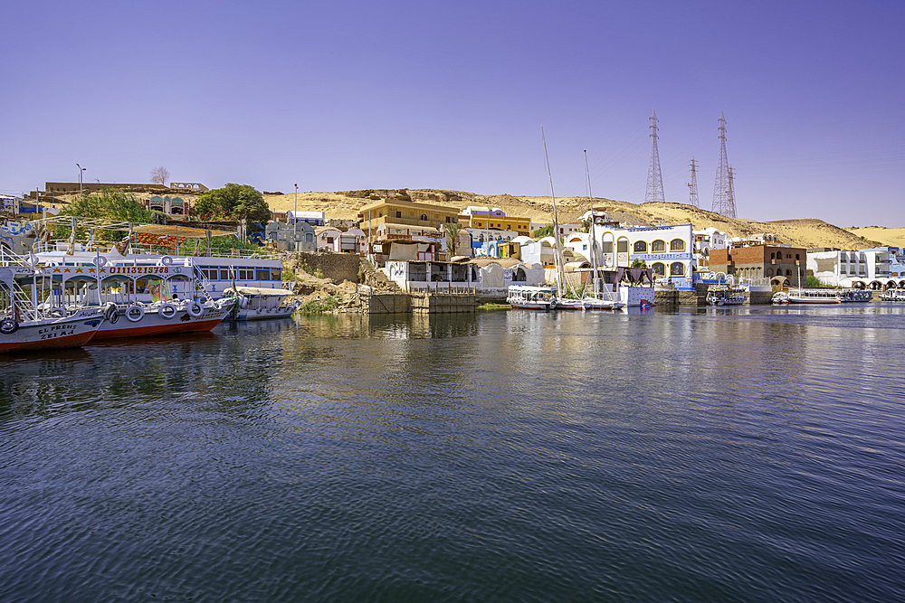 View of colourful architecture at Nagaa Suhayl Gharb on the Nile river near Aswan, Aswan, Nubia, Egypt, North Africa, Africa