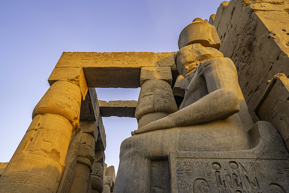 View of Luxor Temple during golden hour, Luxor, Egypt, Africa