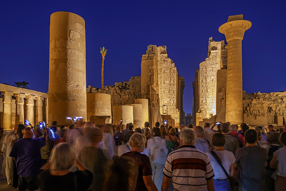 View of Karnak Temple sound and light show at dusk, Luxor, Egypt, Africa