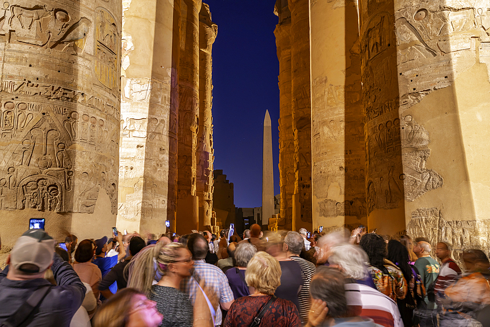 View of Karnak Temple sound and light show at dusk, Luxor, Egypt, Africa