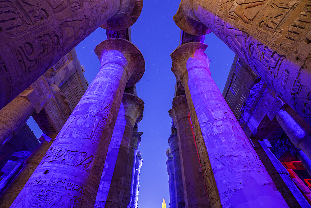 View of Karnak Temple sound and light show at dusk, Luxor, Egypt, Africa