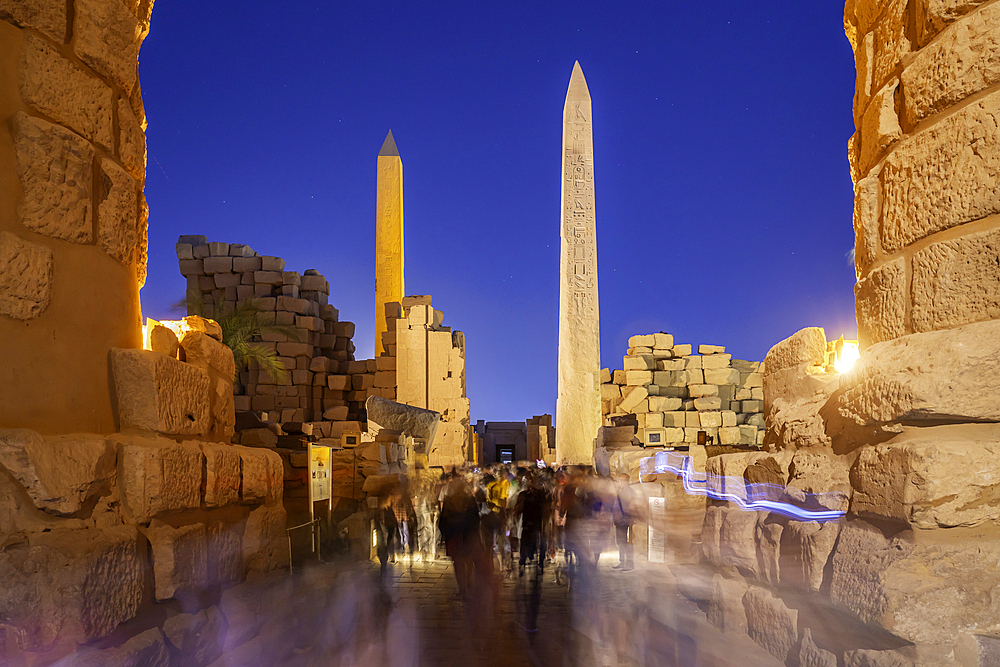 View of Karnak Temple sound and light show at dusk, Luxor, Egypt, Africa