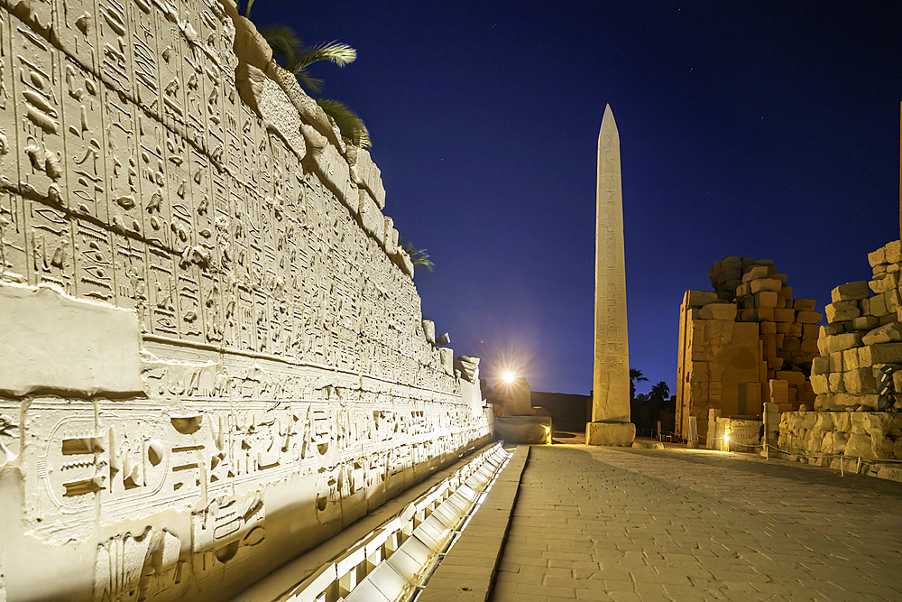 View of Karnak Temple sound and light show at dusk, Luxor, Egypt, Africa