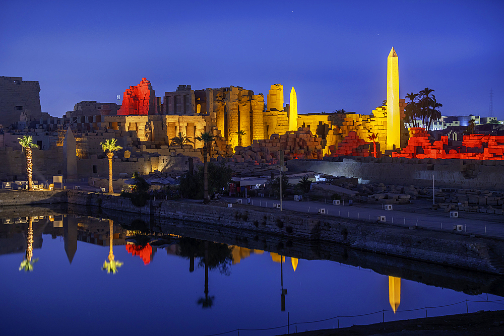 View of Karnak Temple sound and light show at dusk, Luxor, Egypt, Africa