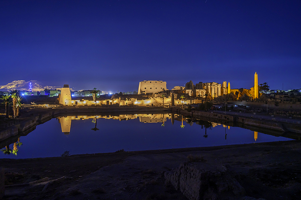 View of Karnak Temple sound and light show at dusk, Luxor, Egypt, Africa