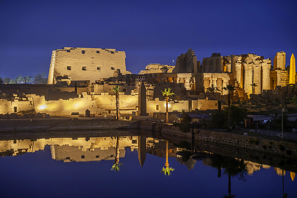 View of Karnak Temple sound and light show at dusk, Luxor, Egypt, Africa