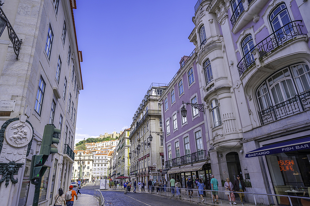 View of shops and Lisbon Castle on a sunny day, Lisbon, Portugal, Europe