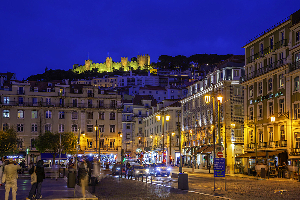 View of hilltop Castelo de São Jorge, (Lisbon Castle) illuminated at dusk, Lisbon, Portugal, Europe