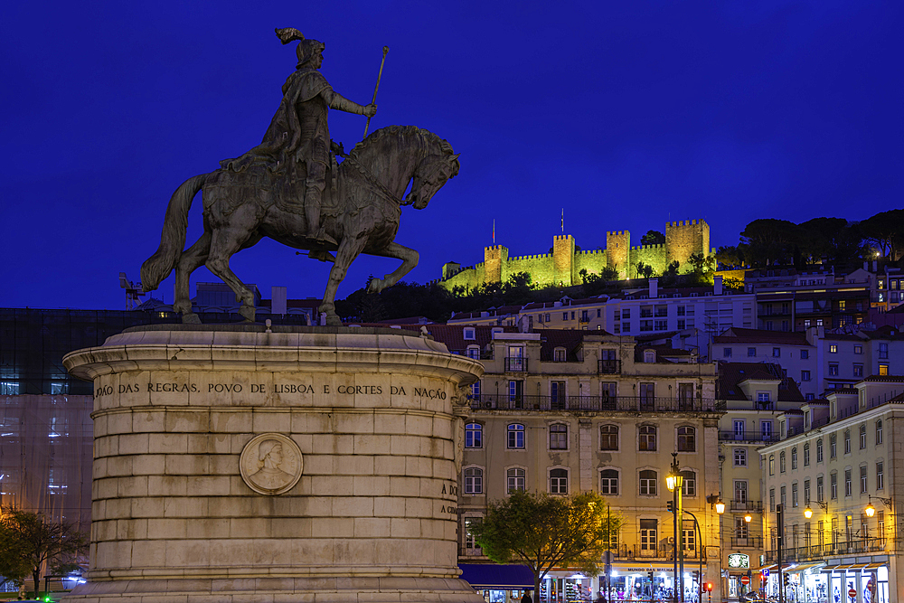 View of hilltop Castelo de São Jorge, (Lisbon Castle) illuminated at dusk, Lisbon, Portugal, Europe