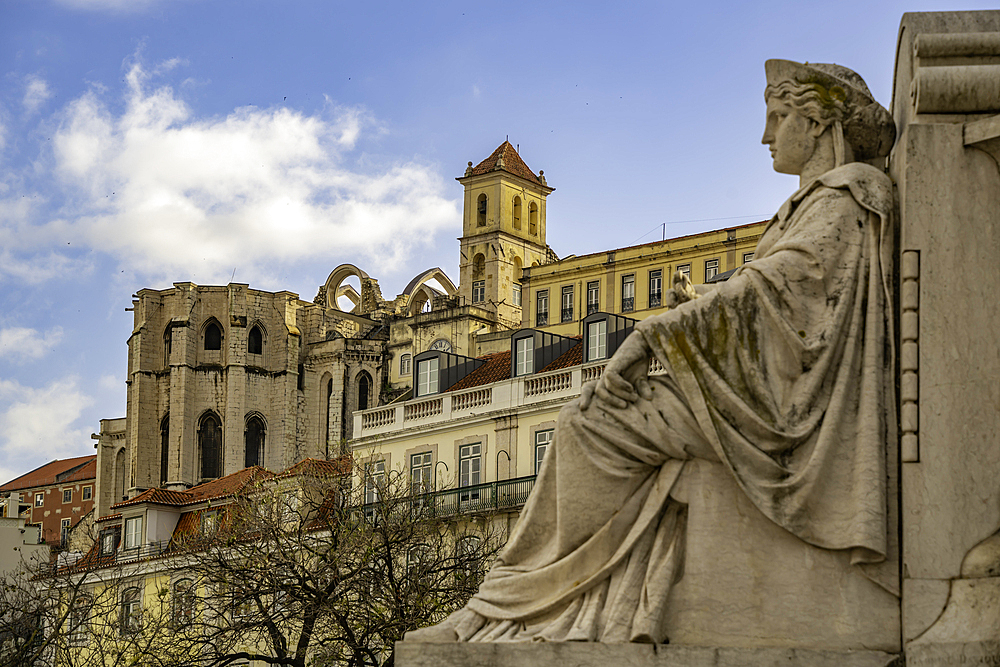 View of South Fountain in Praca do Rossio and Carmo Archaeological Museum, Lisbon, Portugal, Europe