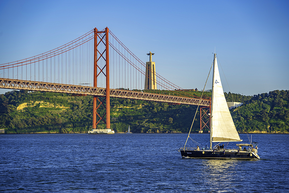 View of Tagus river 25 April Bridge on a sunny day, Lisbon, Portugal, Europe