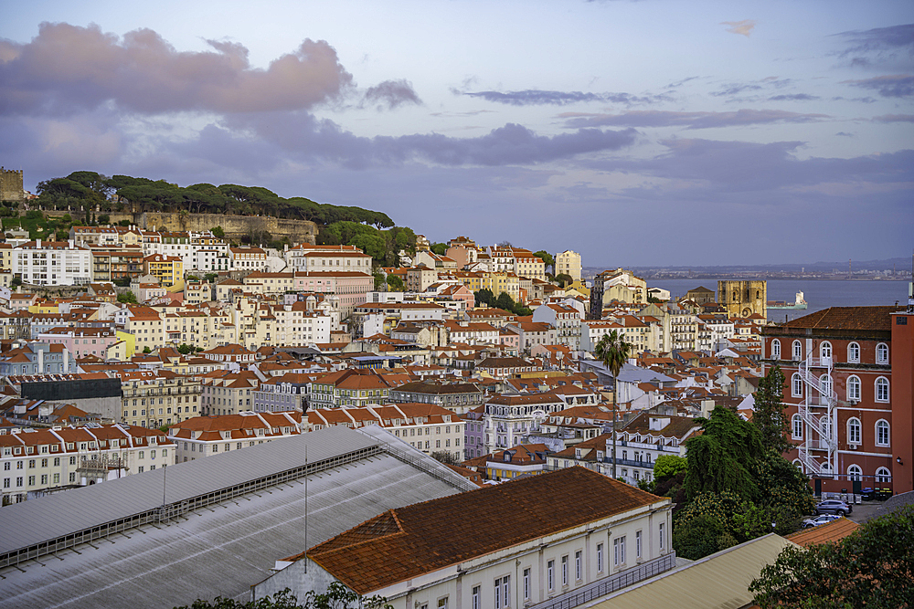 View of Lisbon from Miradouro de Sao Pedro de Alcantara at sunset, Lisbon, Portugal, Europe
