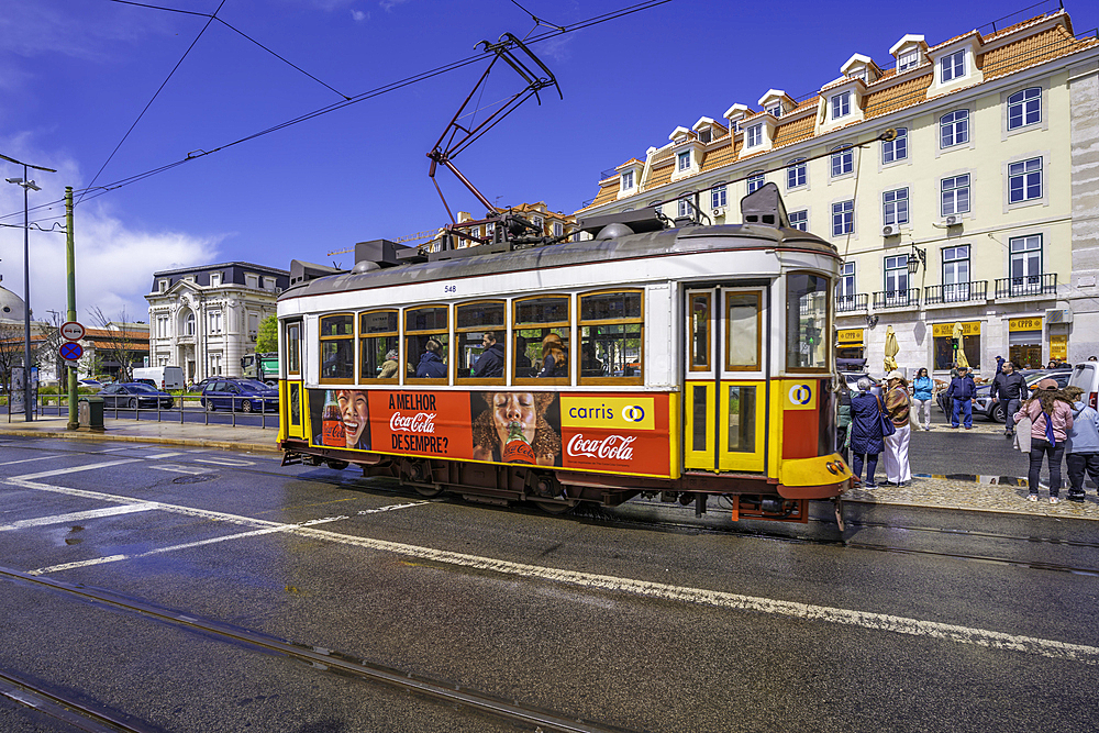 View of a vintage tram in PC Duque da Terceira on a sunny day, Lisbon, Portugal, Europe
