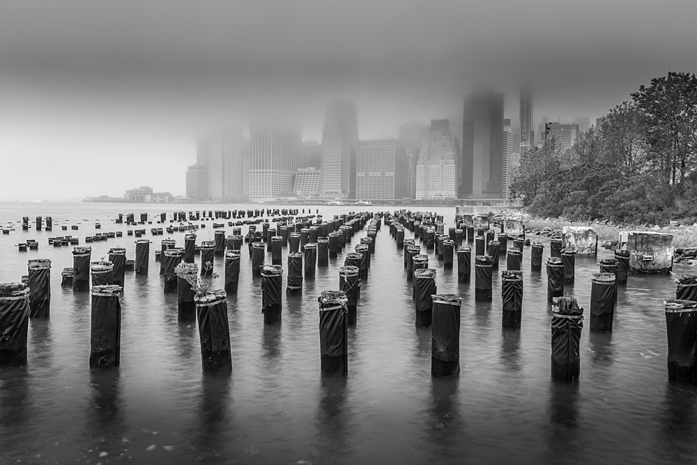 View of Lower Manhattan from Old Pier 1 on a rainy day, Brooklyn Bridge Park, New York City, United States of America, North America