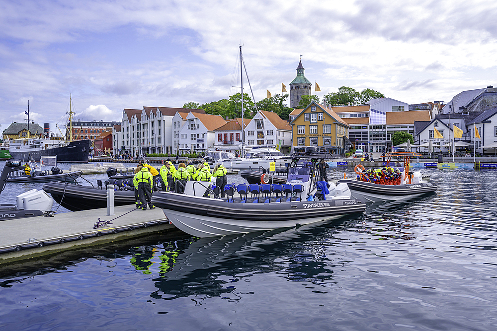 View of watersport activities and Stavanger skyline during daytime, Stavanger, Norway