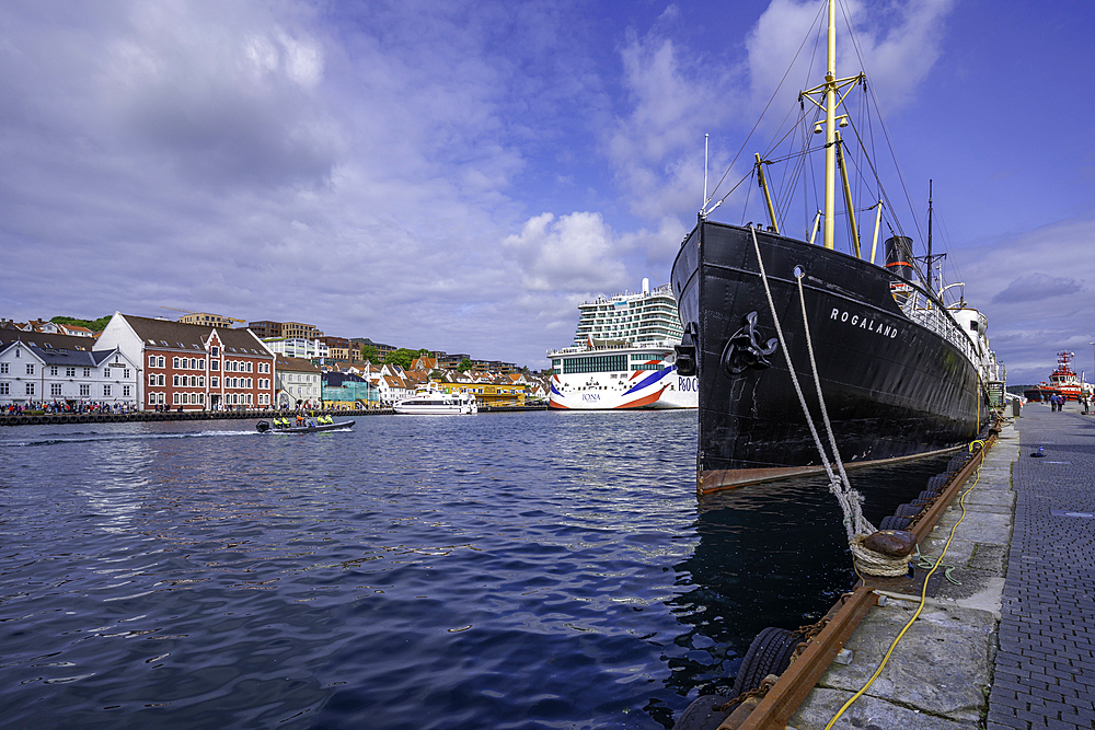 View of boats in harbour and Stavanger skyline during daytime, Stavanger, Norway