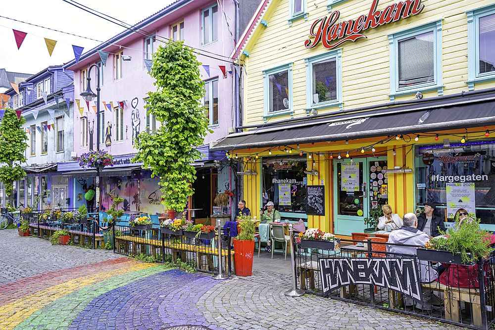 View of colourful shops and cafes in Fargegaten during daytime, Stavanger, Norway
